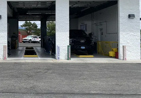 A pickup parked inside an open bay at the Gardnerville service center