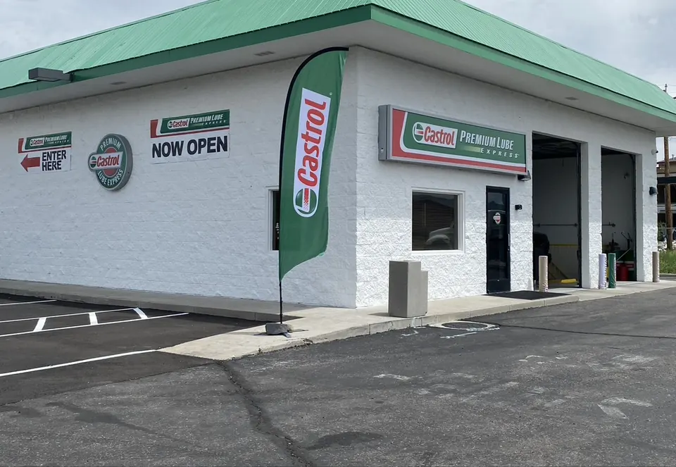 The side of the Gardnerville service center with its entry arrow and open bays